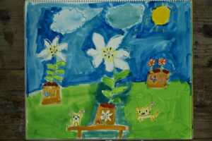 京都の絵画教室東儀画塾で描かれた子供の水彩画
京都の絵画教室東儀画塾で描かれた子供の水彩画 百合の花２輪と動物雲太陽ベンチ